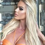 sugar mumma with glass of wine